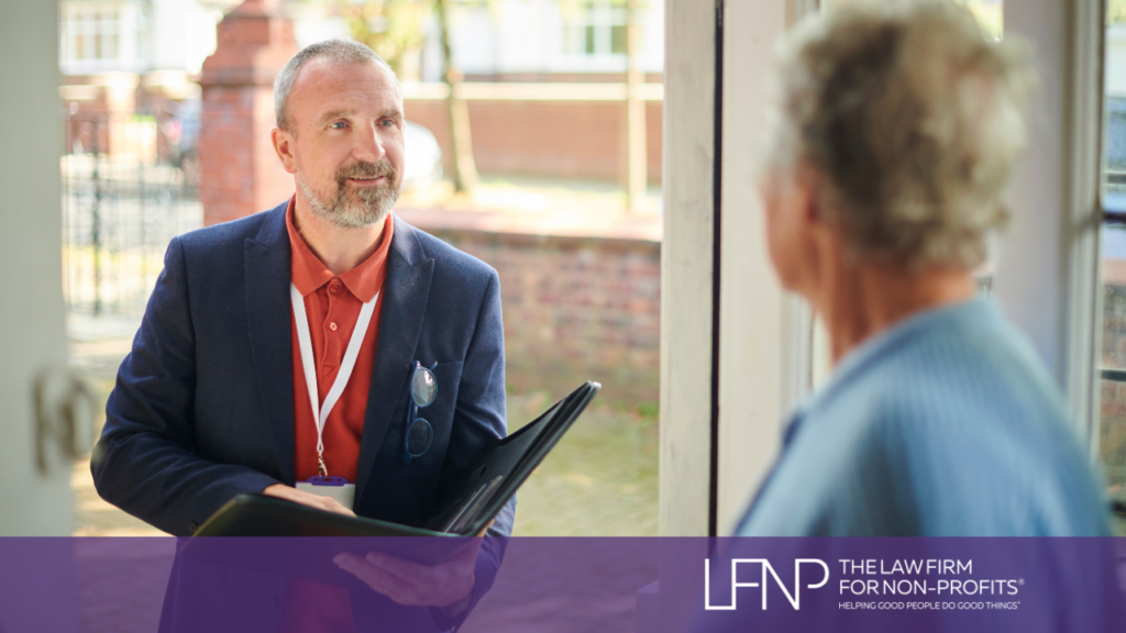 Man from nonprofit standing at a door step conducting charitable solicitations